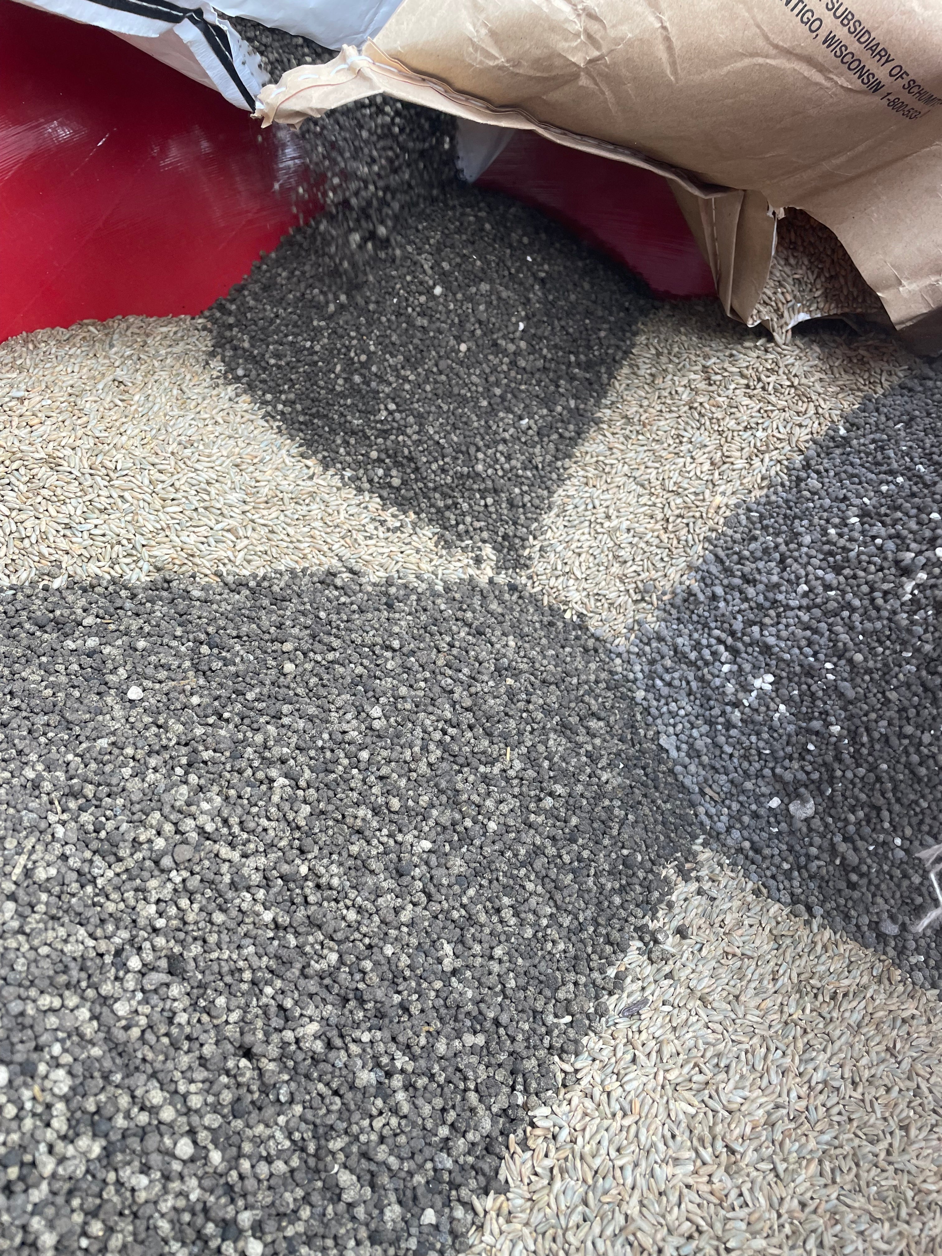 This image shows that TerraNu fertilizers can be mixed with seed for one pass application due to it's non-corrosive nature.